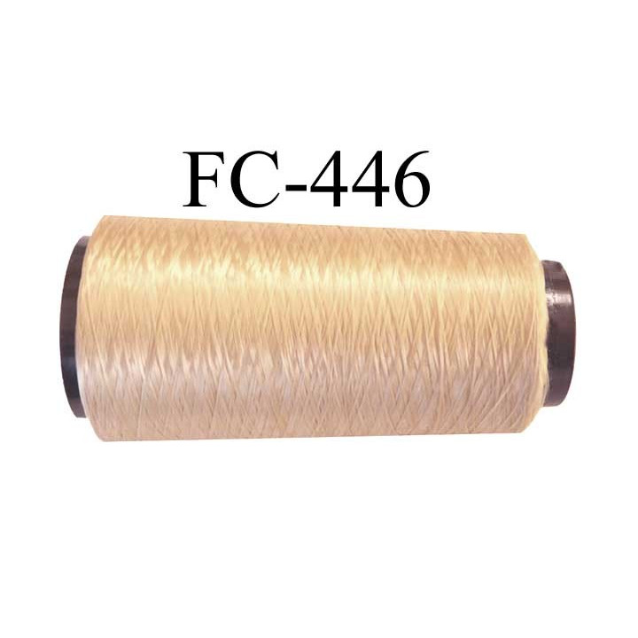 Cone de fil n° 210 mousse texturé polyester très solide couleur blond gold or lumineux longueur 1000 mètres bobiné en France