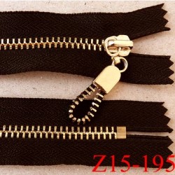 fermeture zip longueur 15 cm couleur noir non séparable largeur 3.2 cm glissière métal doré largeur 6 mm très belle