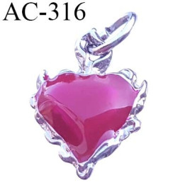 Pendentif forme coeur en résine brillante et métal chromé siglé CL CHRISTIAN LACROIX collector montée sur  anneau h 22 mm L16 mm