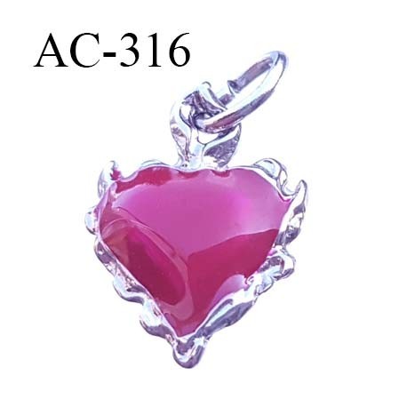 Pendentif forme coeur en résine brillante et métal chromé siglé CL CHRISTIAN LACROIX collector montée sur anneau h 22 mm L16 mm