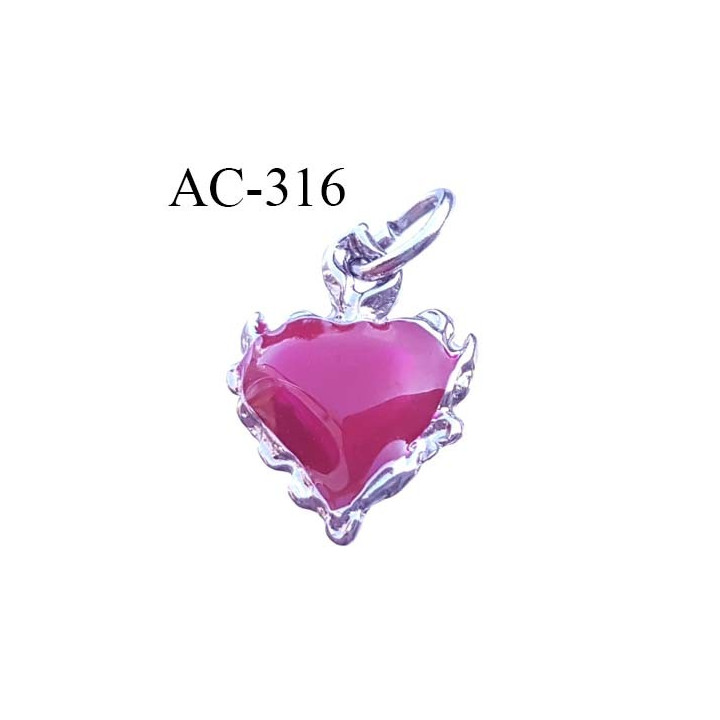 Pendentif forme coeur en résine brillante et métal chromé siglé CL CHRISTIAN LACROIX collector montée sur  anneau h 22 mm L16 mm