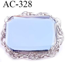 Broche en métal chromé montée sur épingle avec un gros strass taillé  largeur 5 cm hauteur 4 cm épaisseur 1.2  cm