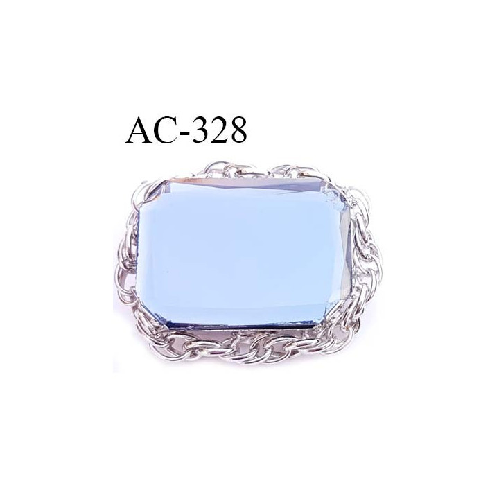 Broche en métal chromé montée sur épingle avec un gros strass taillé  largeur 5 cm hauteur 4 cm épaisseur 1.2  cm