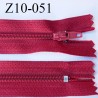fermeture zip longueur 10 cm rouge tirant sur le bordeaux non séparable largeur 2.4 cm glissière nylon largeur 4 mm