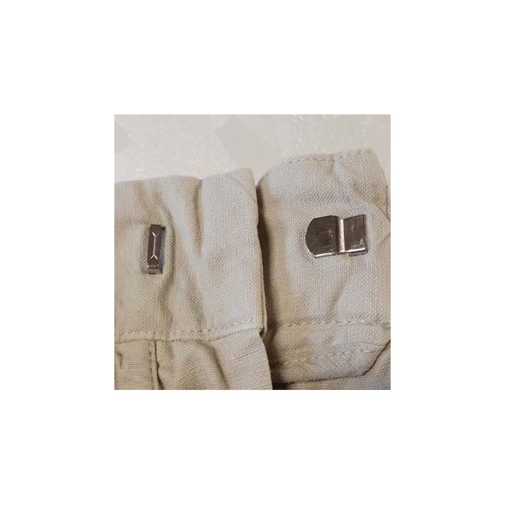 Attache agrafe pantalon en métal haut de gamme d'une grande marque européenne composé de 4 pièces prix des 4 pièces