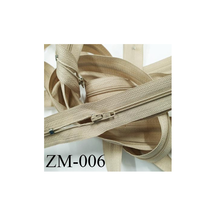 fermeture 70 cm monté sur rouleau couleur BEIGE 1 curseur par fermeture de 70 cm largeur 25 mm largeur du zip 4 mm
