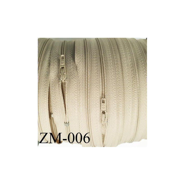 fermeture 70 cm monté sur rouleau couleur BEIGE 1 curseur par fermeture de 70 cm largeur 25 mm largeur du zip 4 mm