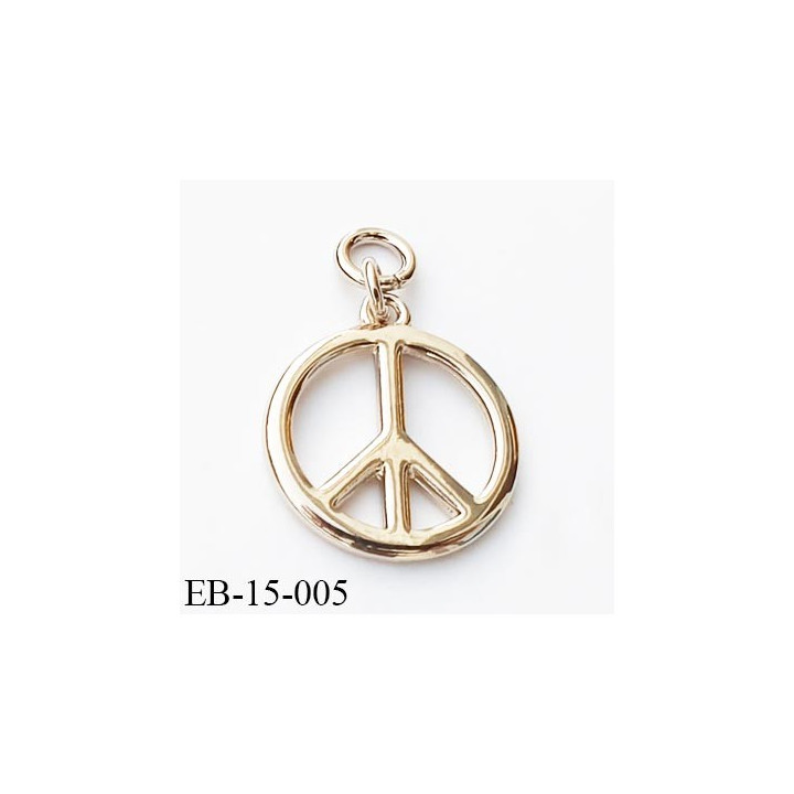 pendentif métal couleur doré superbe diamètre 15 mm épaisseur 1.5 mm  avec un anneau  provient d'une grande marque