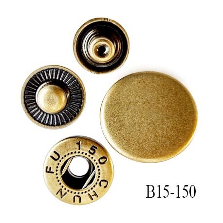 Bouton pression composé de 4 éléments diamètre 15 mm en métal couleur laiton clair