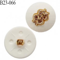 Bouton 23 mm en pvc couleur blanc avec motif doré accroche avec un anneau diamètre 23 mm épaisseur 7.5 mm prix à l'unité