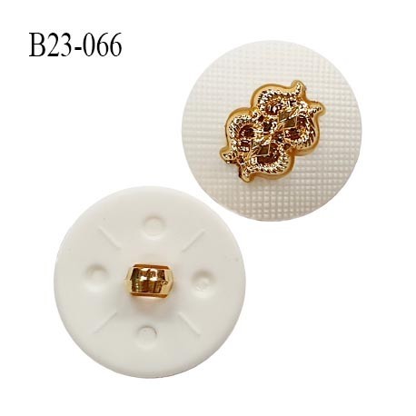 Bouton 23 mm en pvc couleur blanc avec motif doré accroche avec un anneau diamètre 23 mm épaisseur 7.5 mm prix à l'unité