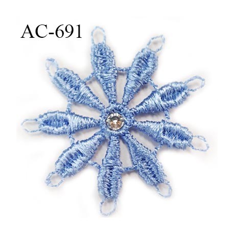 Noeud guipure aigue marine décor lingerie couleur bleu strass au centre haut de gamme diamètre 30 mm