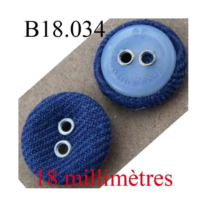 bouton  18 mm couleur bleu en tissu et blanc transparent au dos 2 trous diamètre 18 mm