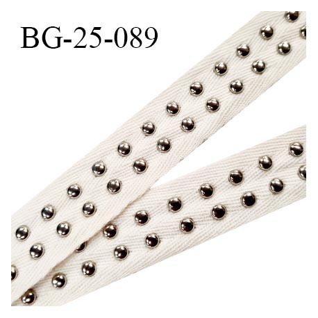 Biais sergé 25 mm couleur beige écru avec rivets bombés couleur chrome tous les 1 cm largeur 25 mm prix au mètre