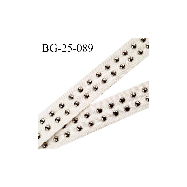 Biais sergé 25 mm couleur beige écru avec rivets bombés couleur chrome tous les 1 cm largeur 25 mm prix au mètre