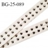 Biais sergé 25 mm couleur beige écru avec rivets bombés couleur chrome tous les 1 cm largeur 25 mm prix au mètre