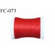 bobine de fil mousse polyester couleur rouge longueur 500 mètres largeur de la bobine 5.5 cm fabriqué en France