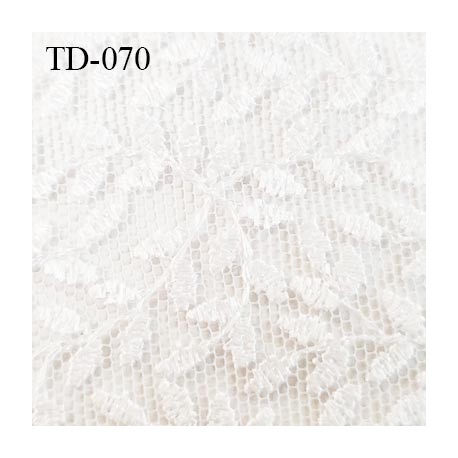 Dentelle brodée sur tulle souple couleur blanc haut de gamme trop belle largeur 130 cm  prix pour 10 centimètres