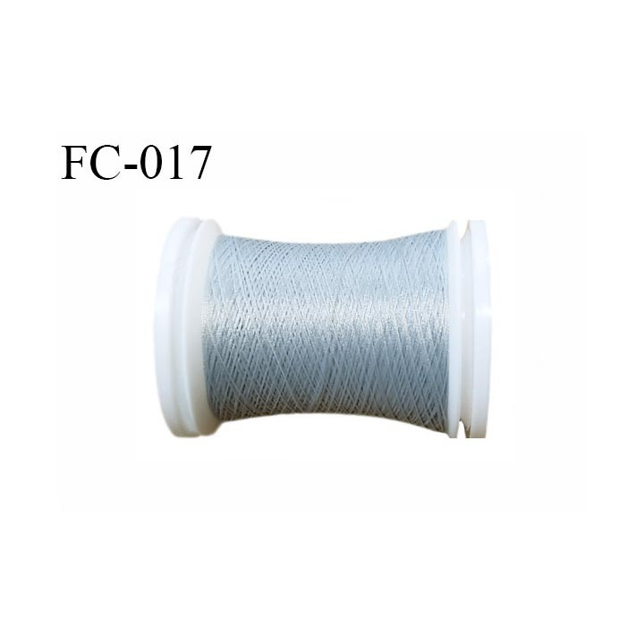 bobine de fil mousse polyester couleur gris longueur 500 mètres largeur de la bobine 5.5 cm fabriqué en France