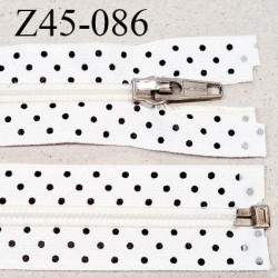 Fermeture 45 cm zip à glissière séparable couleur blanc à pois noirs longueur 45 cm largeur 3.2 cm prix à l'unité