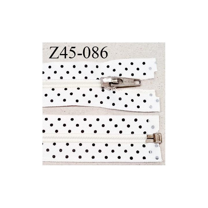Fermeture 45 cm zip à glissière séparable couleur blanc à pois noirs longueur 45 cm largeur 3.2 cm prix à l'unité