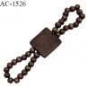 Accessoire perles en bois couleur marron avec deux boucles de perles longueur totale 13 cm largeur 3 cm prix à la pièce