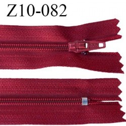 Fermeture zip 10 cm couleur rouge foncé non séparable largeur 2.5 cm glissière nylon largeur 4 mm longueur 10 cm prix à l'unité