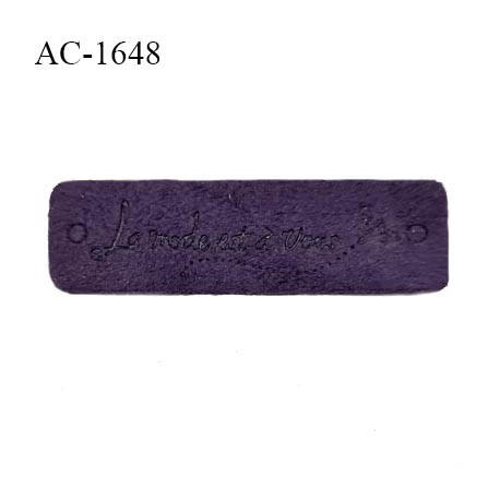 Décor ornement en suédine à coudre couleur violet inscription La mode est à vous longueur 45 mm hauteur 14 mm prix à la pièce