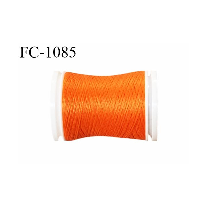 Bobine de fil 500 m mousse polyester n° 110 polyester couleur orange lumineux  longueur 500  mètres bobiné en France