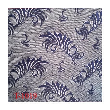 Tissu dentelle brodée bleu sur tulle extensible lycra dans les 2 sens haut de gamme largeur 150 cm prix pour 10 cm de long