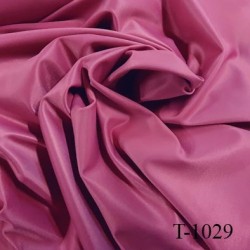 Tissu maillot de bain couleur camélia très haut de gamme lycra élasthanne largeur 96 cm 280 grs m2 prix pour 10 cm de long