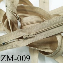 Fermeture 75 cm montée sur rouleau couleur BEIGE 1 curseur par fermeture de 75 cm largeur 25 mm largeur du zip 4 mm