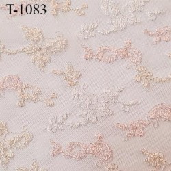 Dentelle brodée couleur rose  blanc et ocre clair sur tulle non extensible haut de gamme largeur 140 cm prix pour 10 cm de long