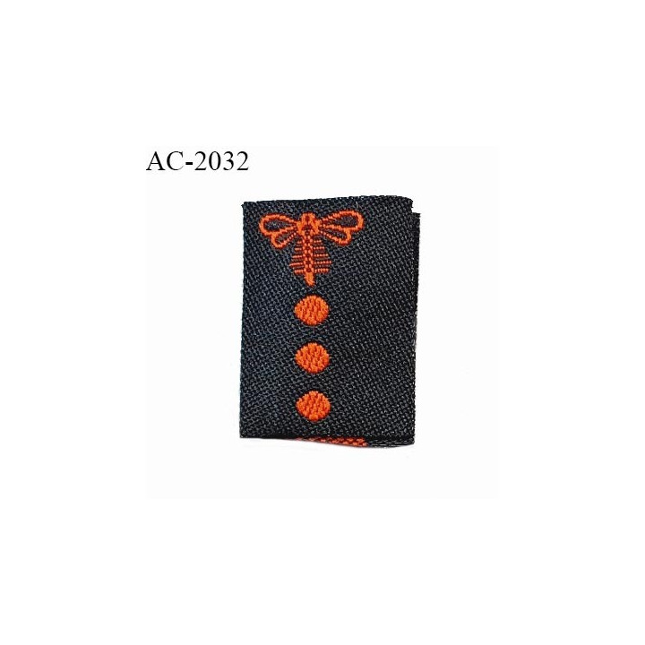 Etiquette tissée à coudre motif libellule de Brocéliande couleur noir et orange prix à l'unité
