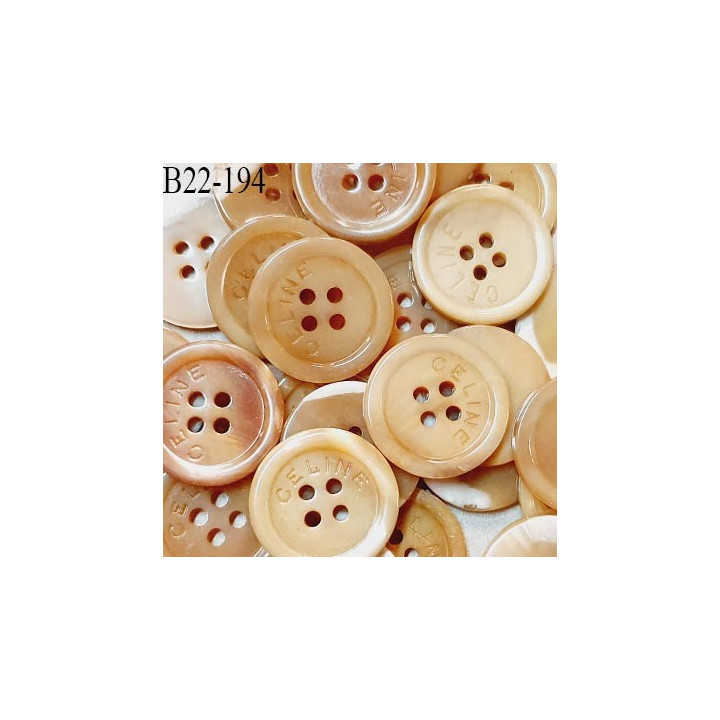 Bouton nacré 22 mm inscription CELINE couleur beige foncé 4 trous diamètre 22 mm épaisseur 3 mm prix à l'unité