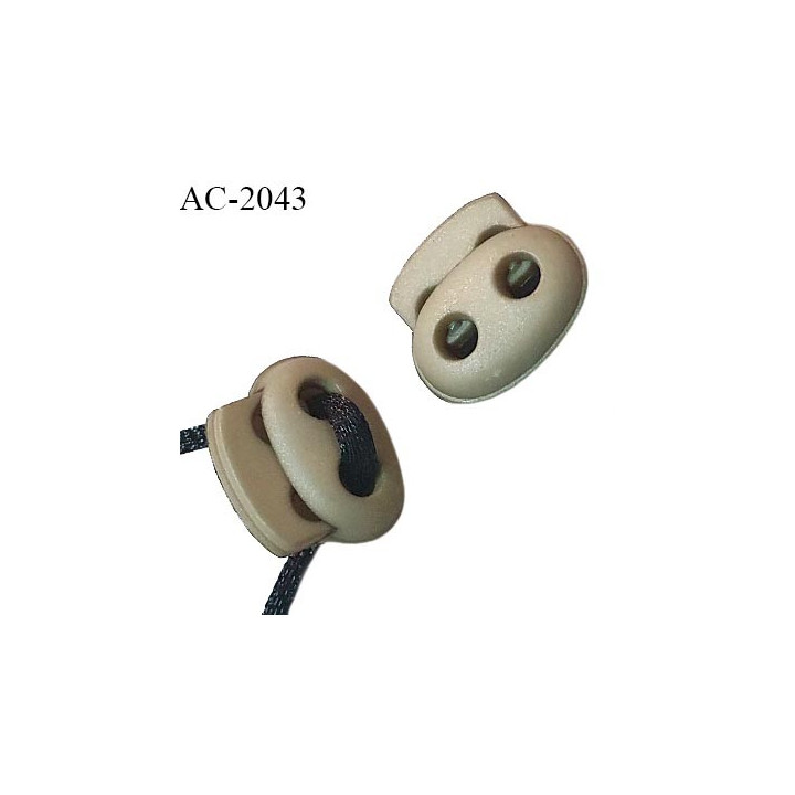 Arrêt stop cordon oval 2 trous en pvc à ressort couleur kaki clair 18 mm x 16 mm  prix à l'unité