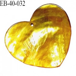 Pendentif coeur en nacre couleur vert avec reflets orangés largeur 40 mm hauteur 38 mm prix à l'unité