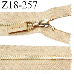 Fermeture zip 18 cm non séparable couleur beige longueur 18 cm largeur 2.7 cm glissière métal couleur doré prix à l'unité