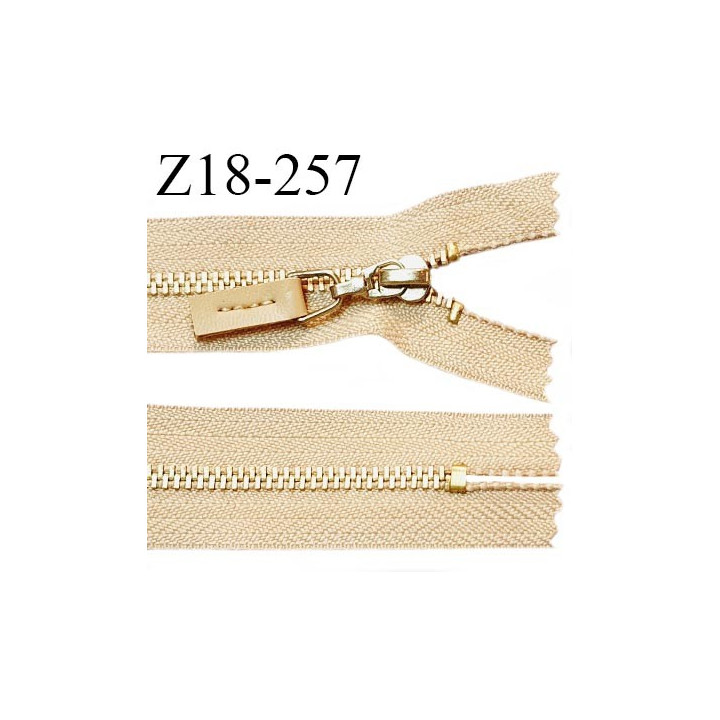 Fermeture zip 18 cm non séparable couleur beige longueur 18 cm largeur 2.7 cm glissière métal couleur doré prix à l'unité