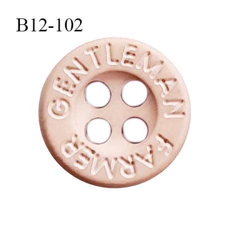 Bouton 12 mm en pvc couleur beige rosé inscription Gentleman Farmer 4 trous diamètre 12 mm épaisseur 3 mm prix à la pièce
