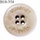 Bouton 18 mm couleur beige clair inscription Vuarnet 4 trous diamètre 18 mm épaisseur 4 mm prix à l'unité