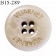 Bouton 15 mm couleur beige clair inscription Vuarnet 4 trous diamètre 15 mm épaisseur 3 mm prix à l'unité