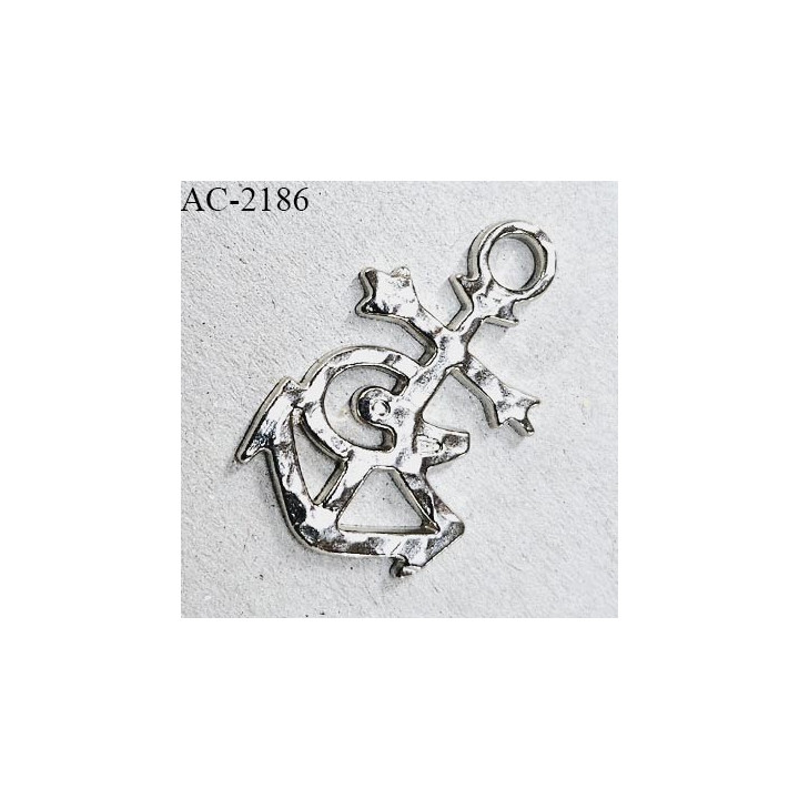 Pendentif décor ornement bijou en forme d'ancre marine siglée Christian Lacroix en métal couleur argent prix à l'unité