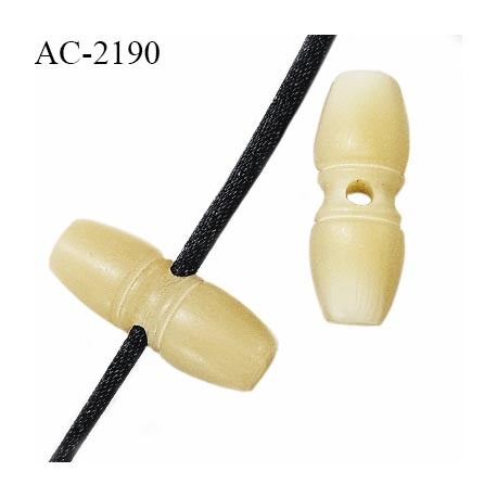 Embout stop cordon en pvc couleur beige hauteur 25 mm largeur 10 mm passage pour cordon de 2 mm prix à l'unité