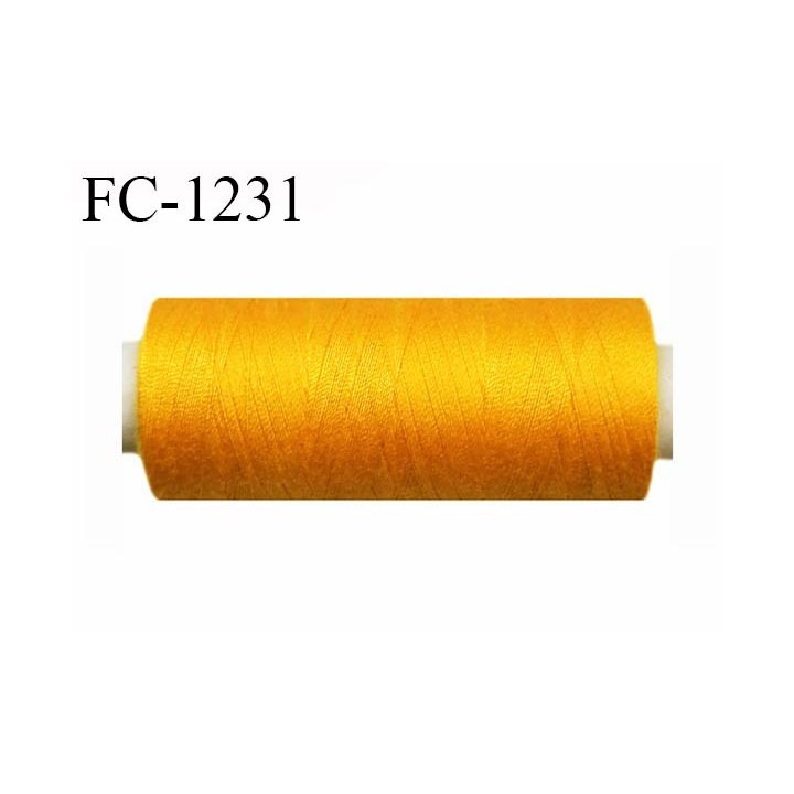 Cone 500 m fil polyester fil n°80 couleur orange clair longueur du cone 500 mètres bobiné en France certifié oeko tex