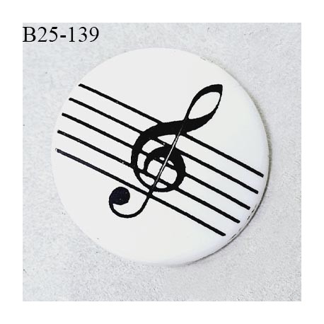 Bouton 25 mm en pvc couleur blanc à motif clef de sol noire fabriqué en France accroche avec un anneau prix à l'unité