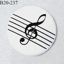 Bouton 20 mm en pvc couleur blanc à motif clef de sol noire fabriqué en France accroche avec un anneau prix à l'unité