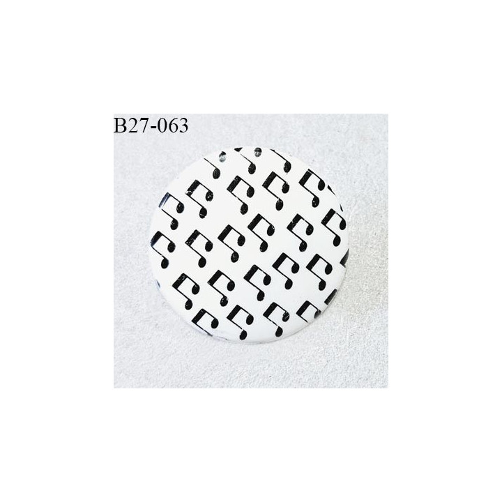 Bouton 27 mm en pvc couleur blanc motif notes de musique fabriqué en France diamètre 27 mm épaisseur 3 mm prix à l'unité