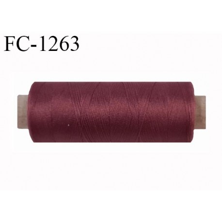 Bobine de fil 500 m mousse polyester n° 110 polyester couleur lie de vin clair longueur 500 mètres bobiné en France