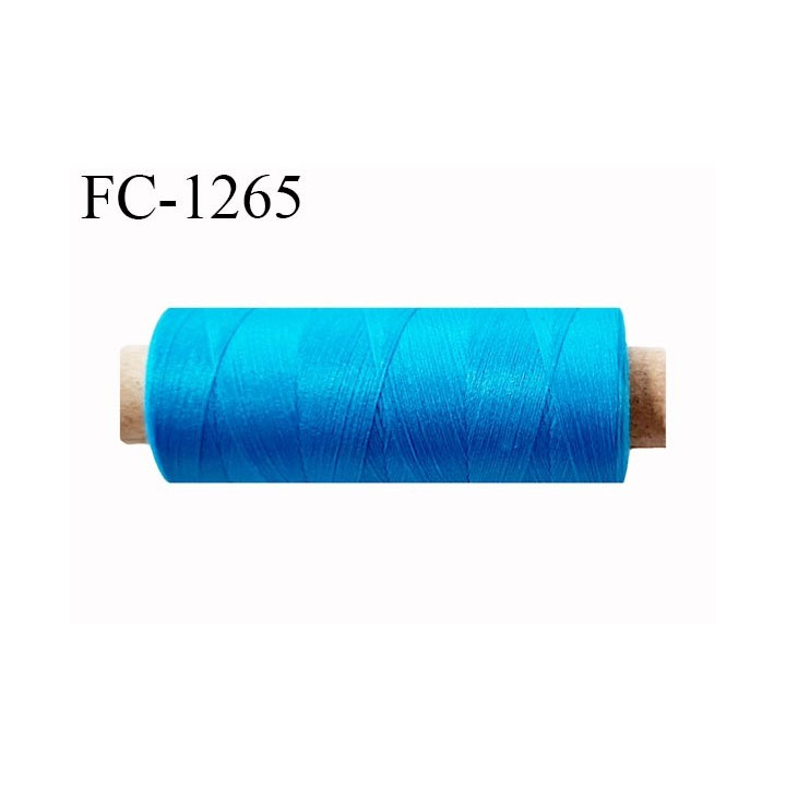 Bobine de fil 500 m mousse polyester n° 110 polyester couleur bleu turquoise longueur 500  mètres bobiné en France